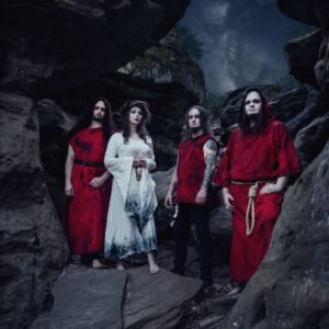 Ritualistic band photo among rocky formations