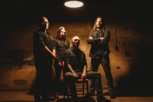 Band photo in rustic dim room